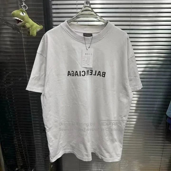 Balenciaga Inverted Logo Distressed Tee.