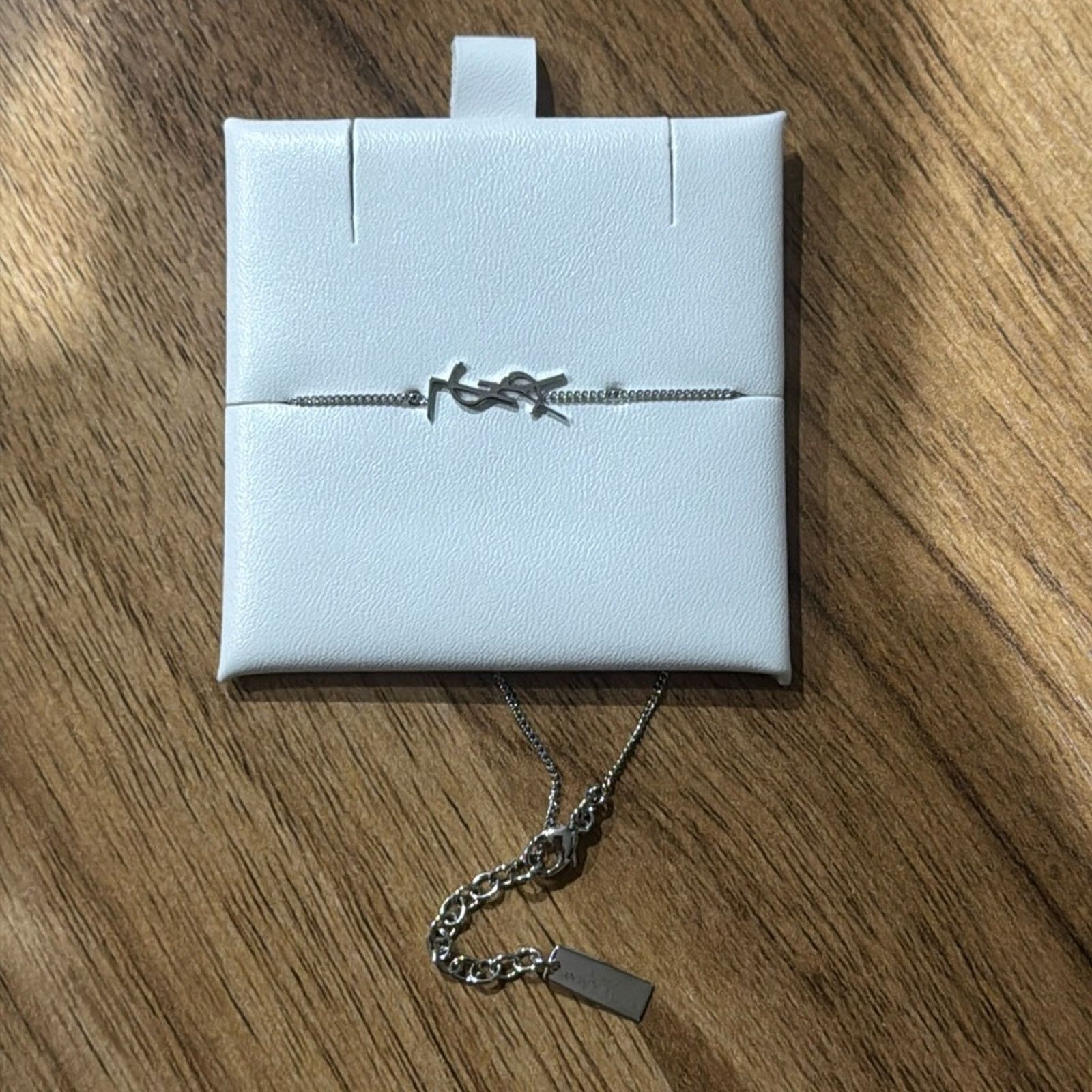 Yves Saint Laurent Silver Cassandre charm YSL bracelet Size ONE SIZE - 1 Thumbnail