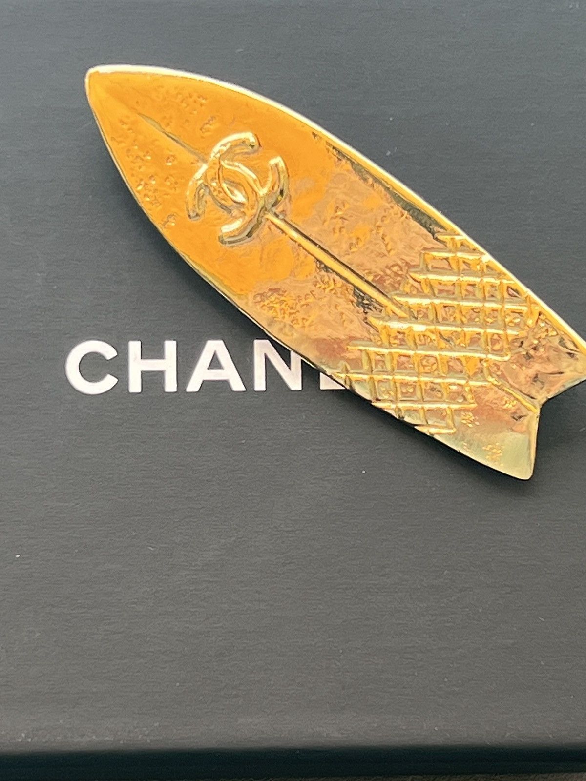 Amazing Chanel gold surfboard brooch.