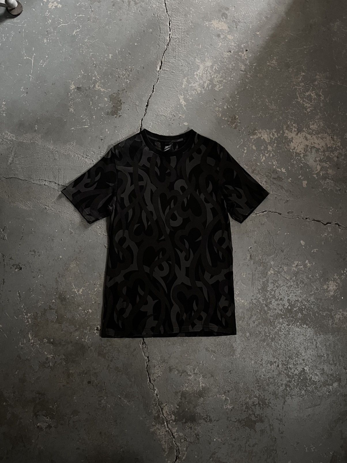 image of Number N Ine x Takahiromiyashita The Soloist Fw04 Tribal Heart Camo ‘Anti-War’ Tee in Black/Grey (S