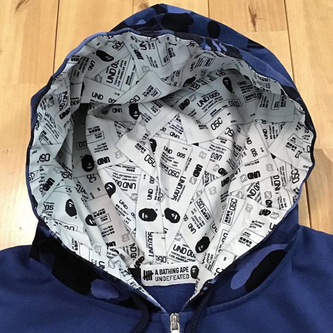 Bape × Undefeated BAPE × Undefeated zip hoodie blue camo a bathing ape Size US L / EU 52-54 / 3 - 4 Thumbnail