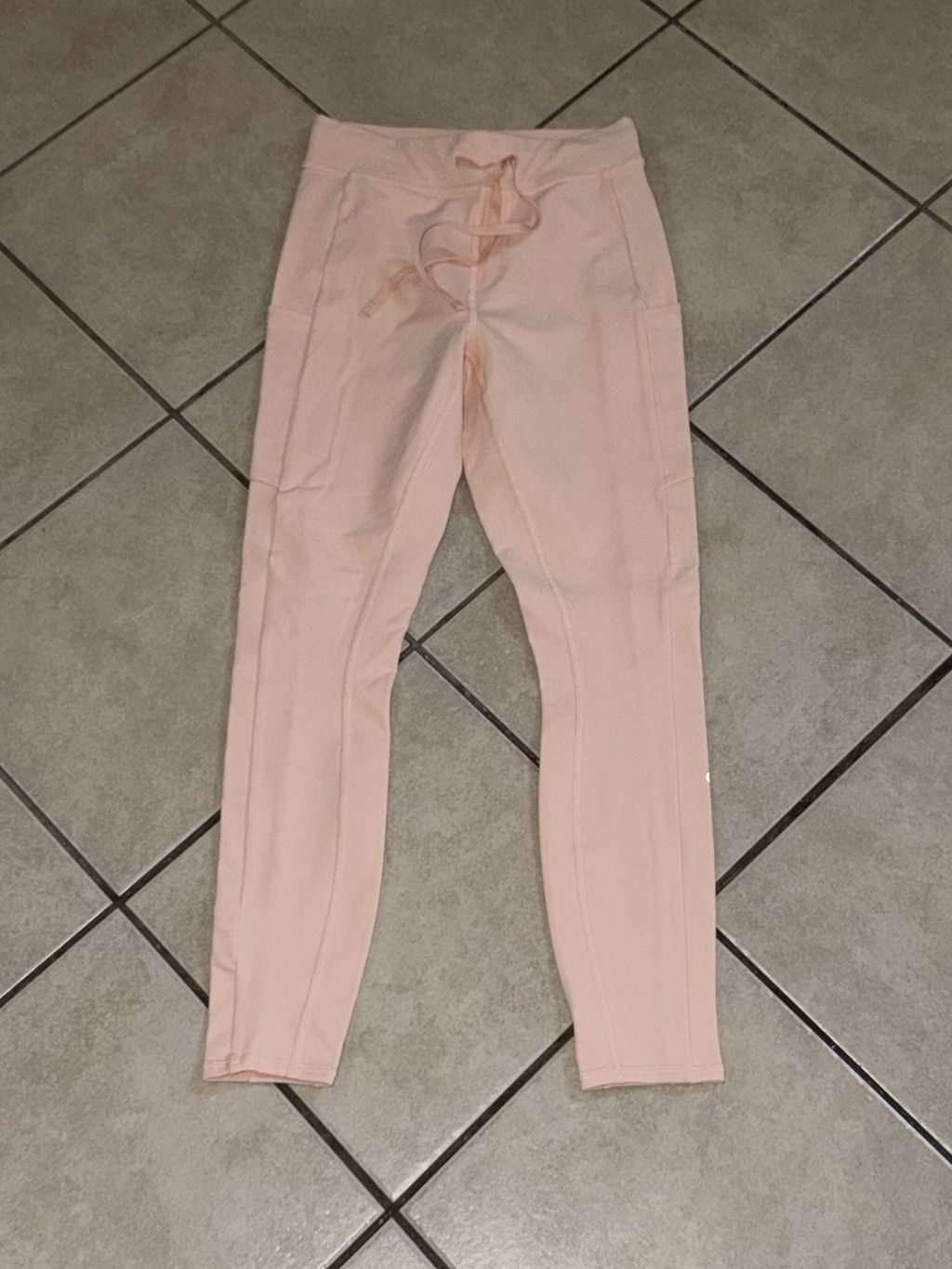 Alo Yoga ALO YOGA CHECKPOINT TIE FRONT LEGGING LIGHT NEON ORANGE XS Size 26" / US 2 / IT 38 - 7 Thumbnail