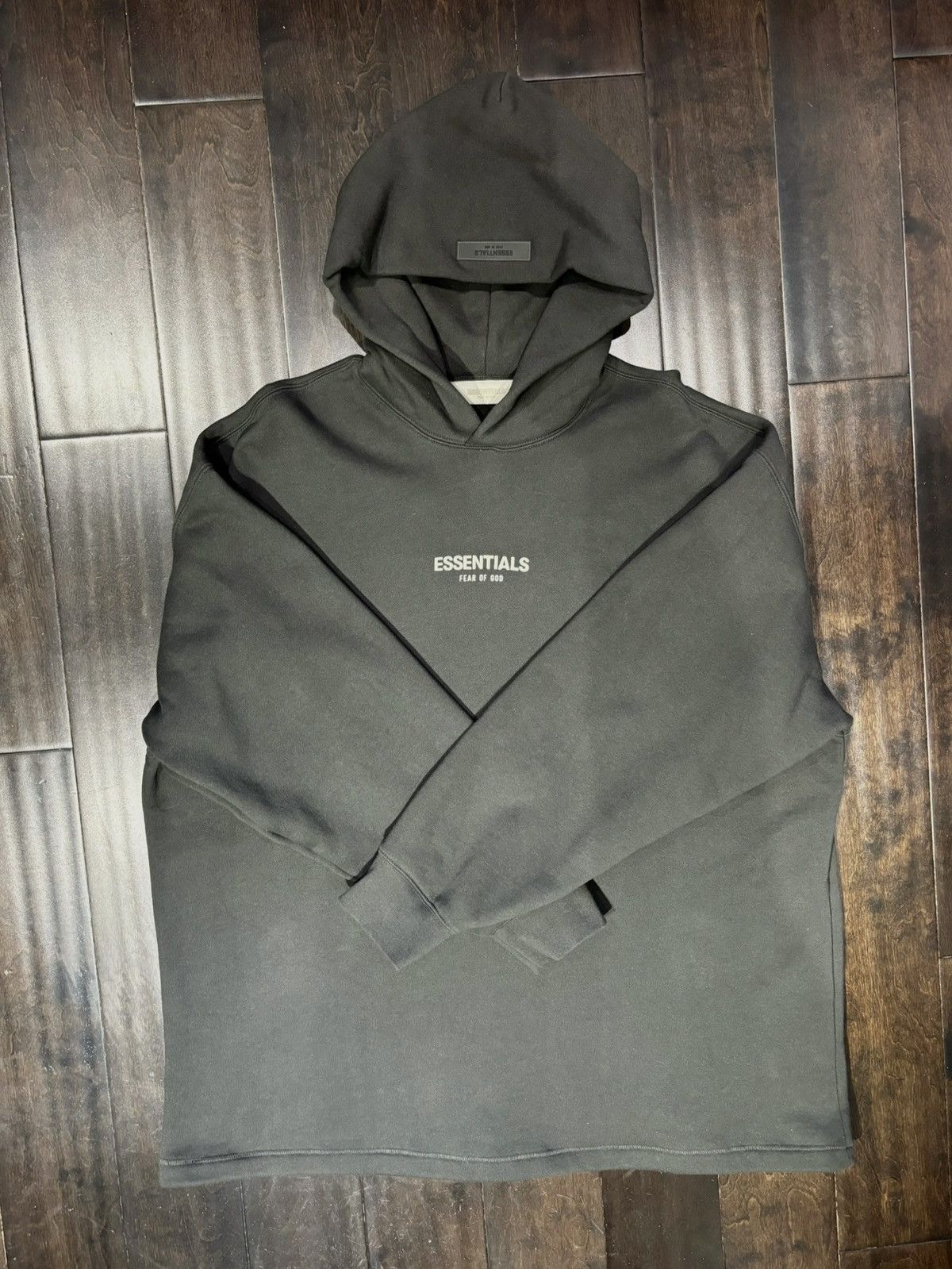 Offers Fear Of God Essentials Iron Black Relaxed Hoodie