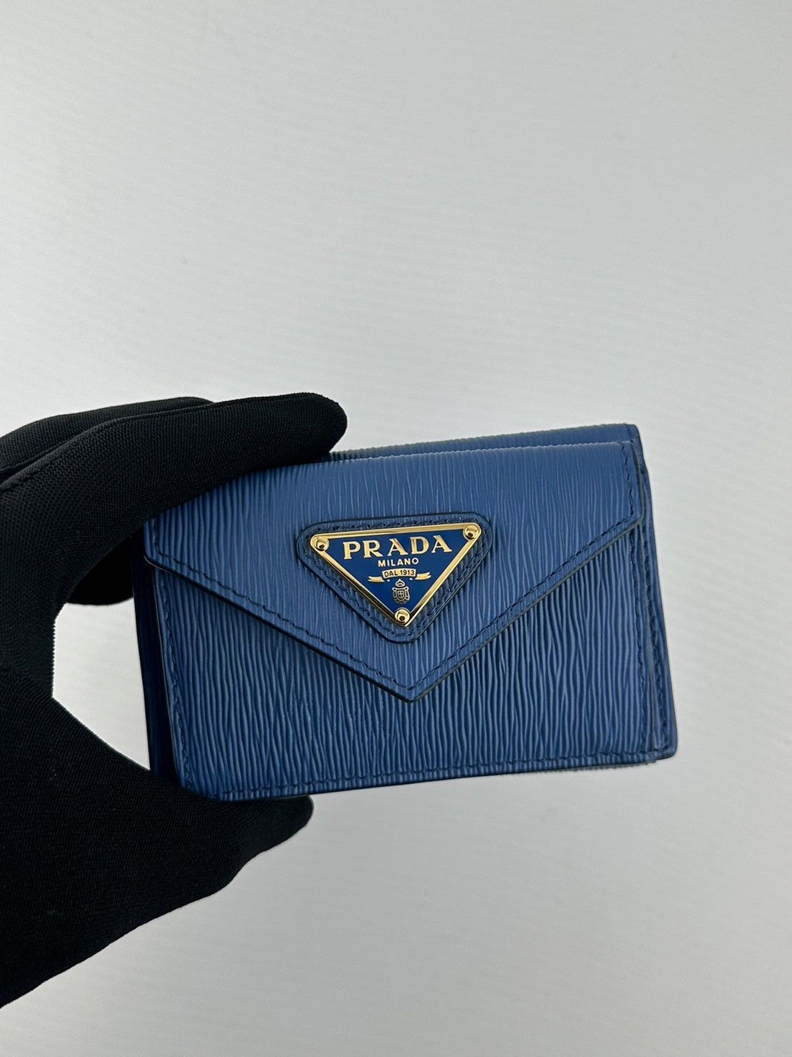 image of Prada Trifold Wallet Compact Bule Gold Metal in Blue, Women's