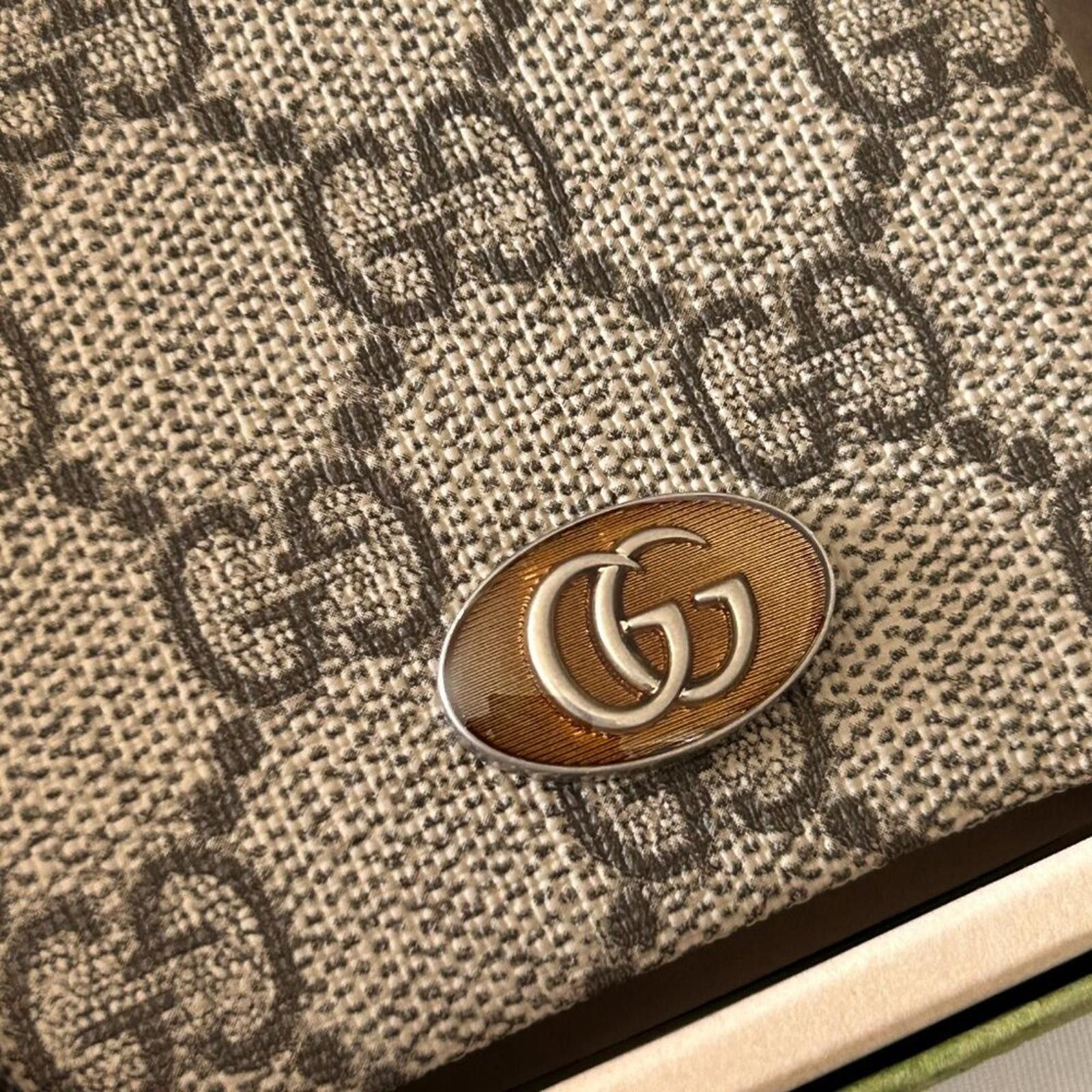 Gucci NWT Gucci GG Supreme PVC iPhone 14 Case Beige 753609 Size ONE SIZE - 8 Thumbnail