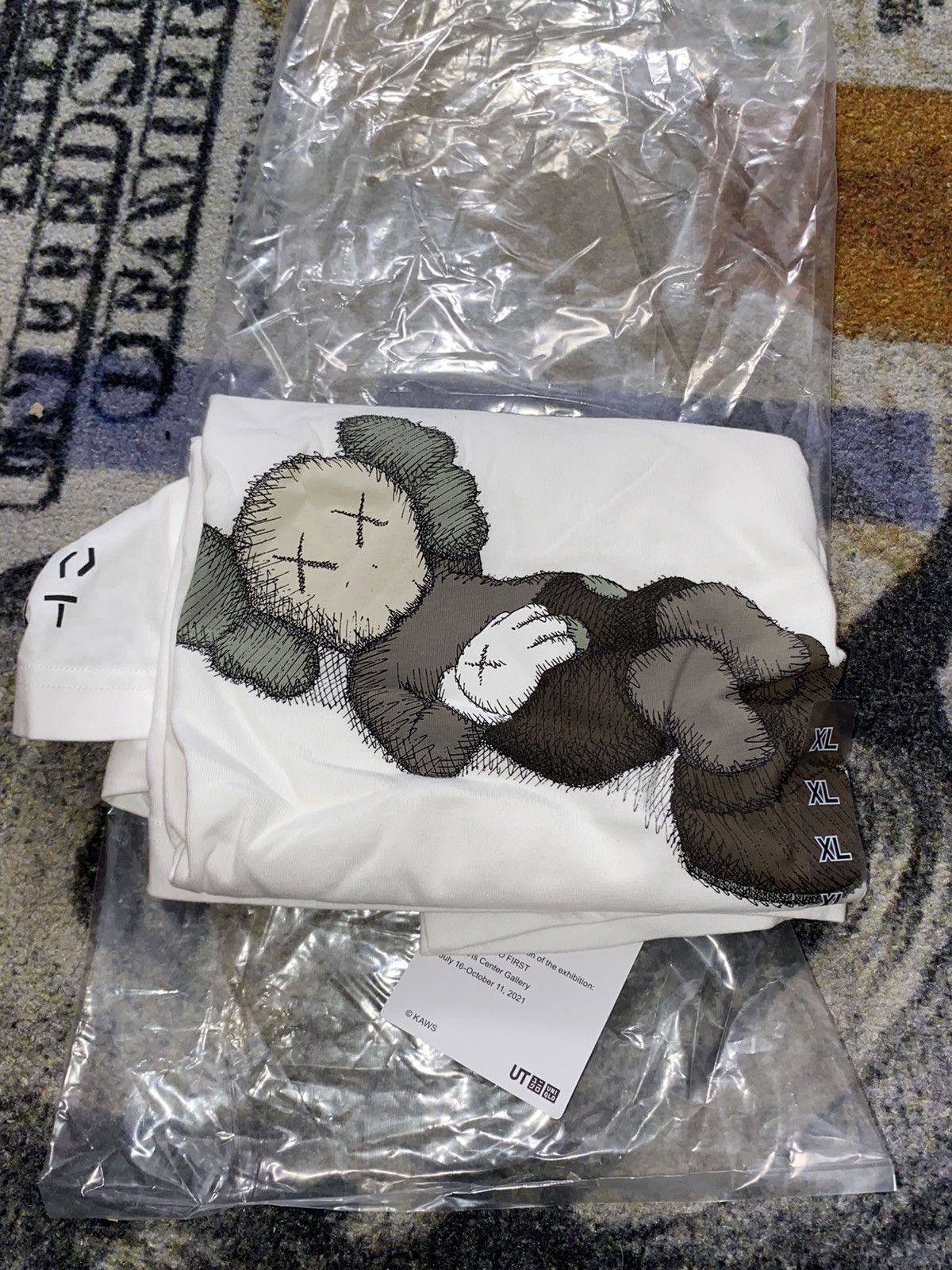 Japanese Brand × Kaws × Uniqlo KAWS Uniqlo Tokyo First Tee (Asian Sizing) Size US XL / EU 56 / 4 - 1 Thumbnail