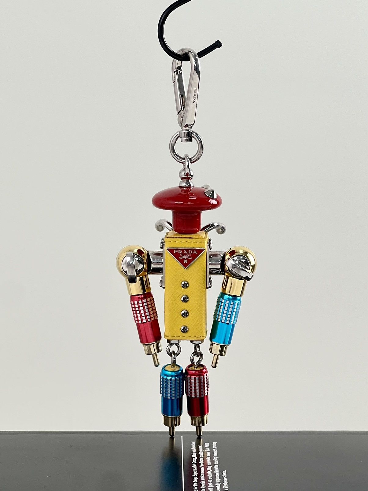 image of Prada Japan Exclusive Keyring in Yellow, Men's