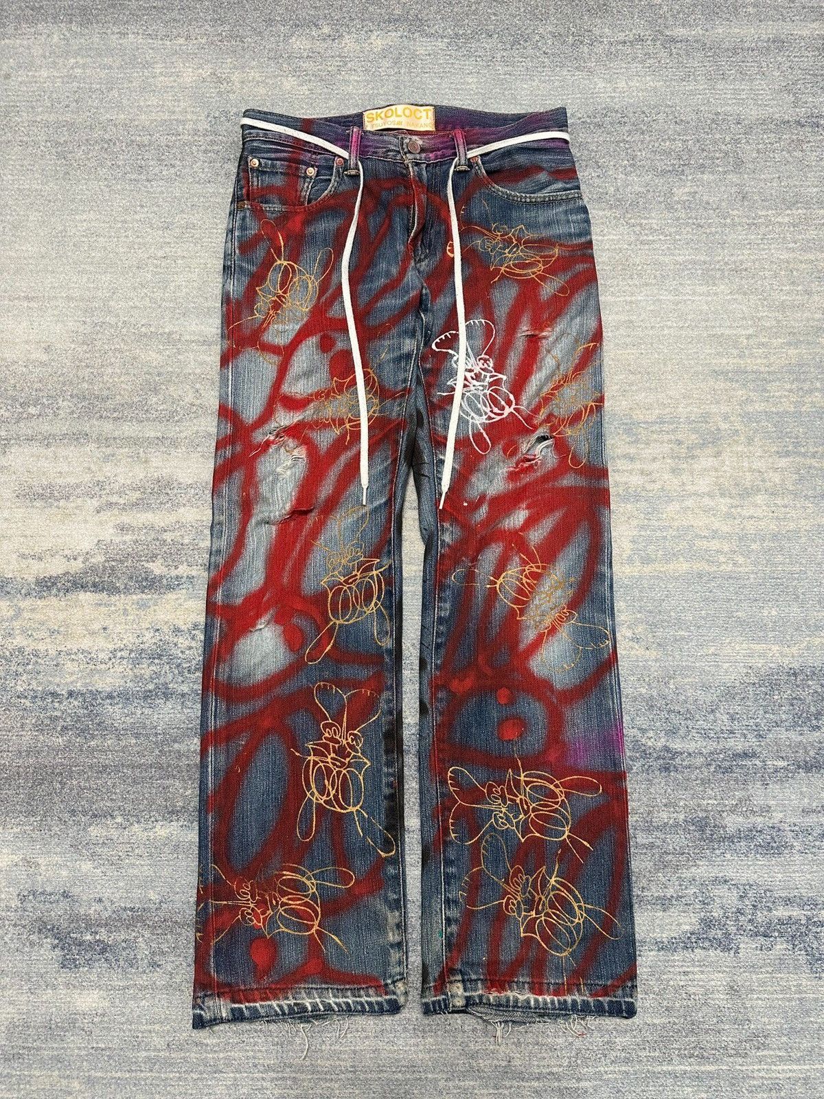Skoloct Skoloct hand painted graffiti jeans | Grailed