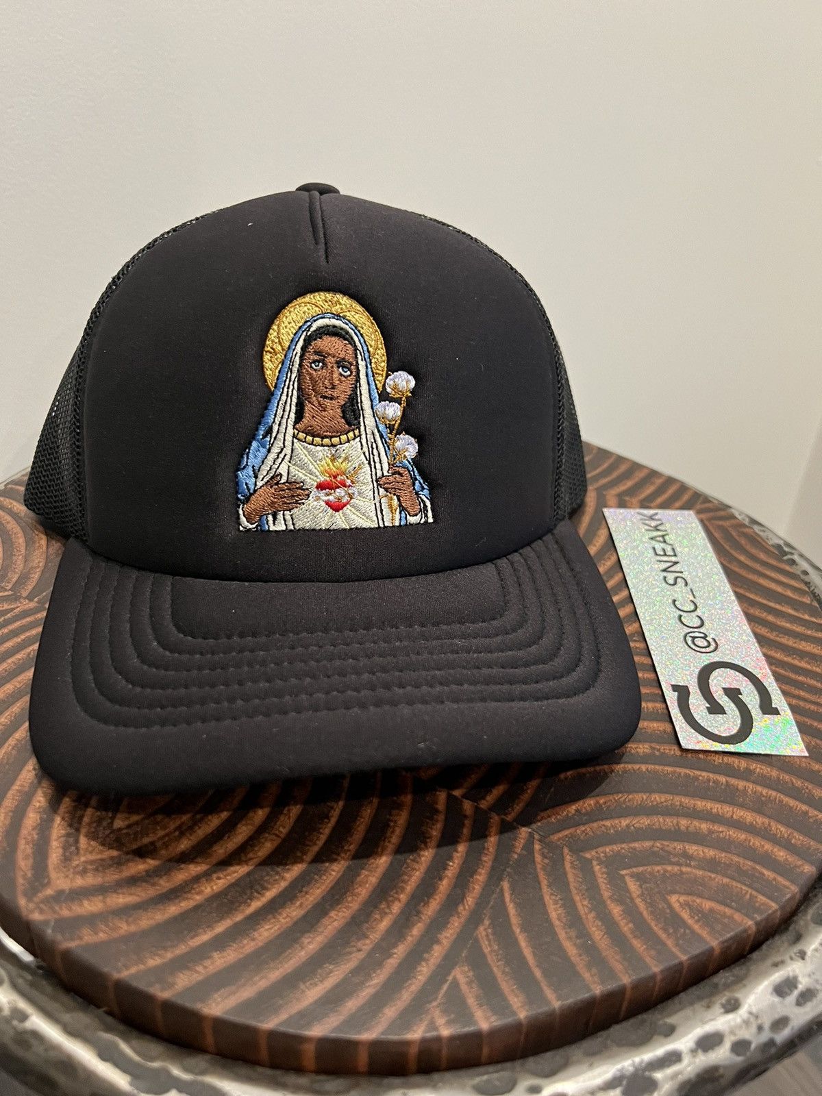 image of Denim Tears Saint Mary Southern Man Trucker Hat in Black, Men's
