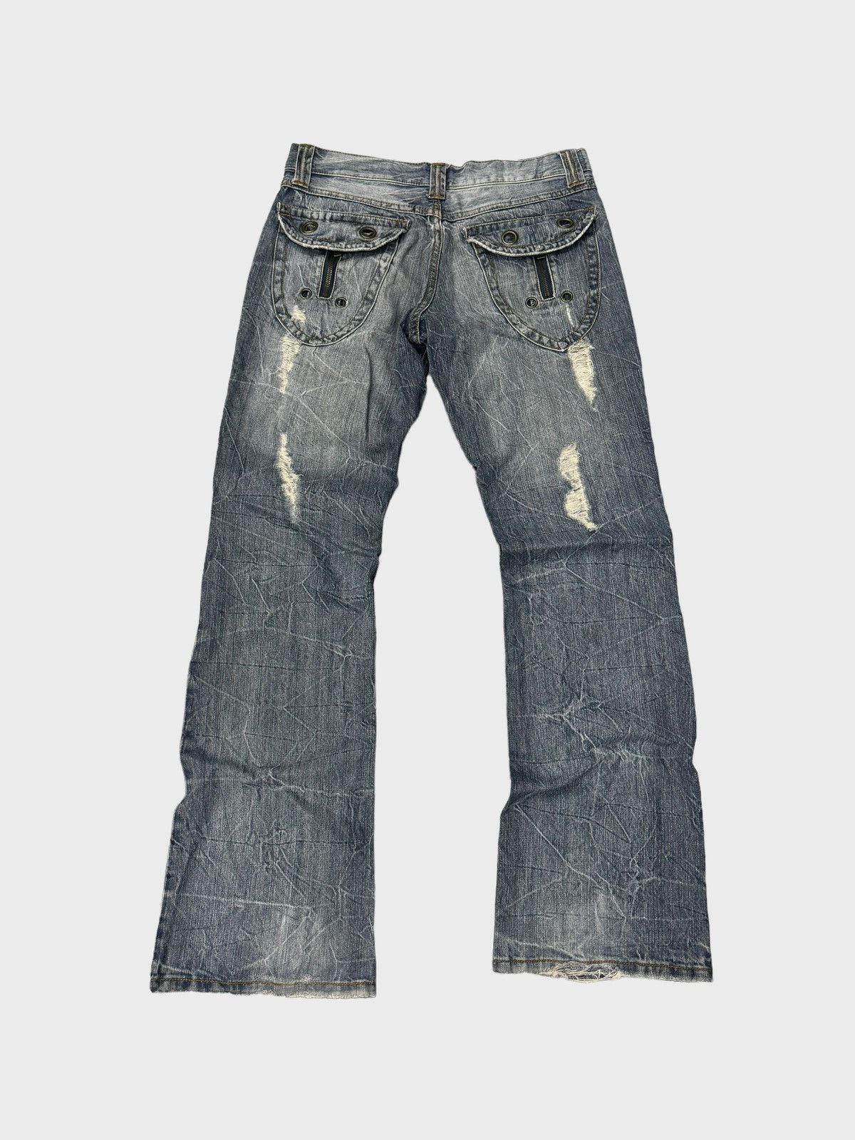 FLARE SEMANTIC DESIGN DISTRESSED BOOT CUT DENIM