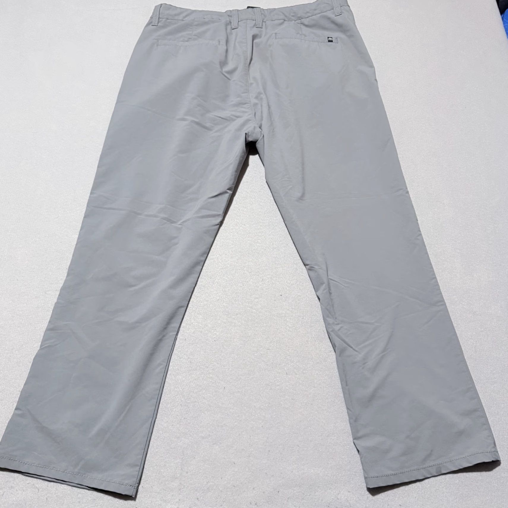 TravisMathew TravisMathew Golf Pants Men Gray 36 Stretch - 36 Chino, Flat Front, Regular, Inseam 27, Logo, Buttons Zip, Solid, Casual Accessories Size US 36 / EU 52 - 2 Thumbnail