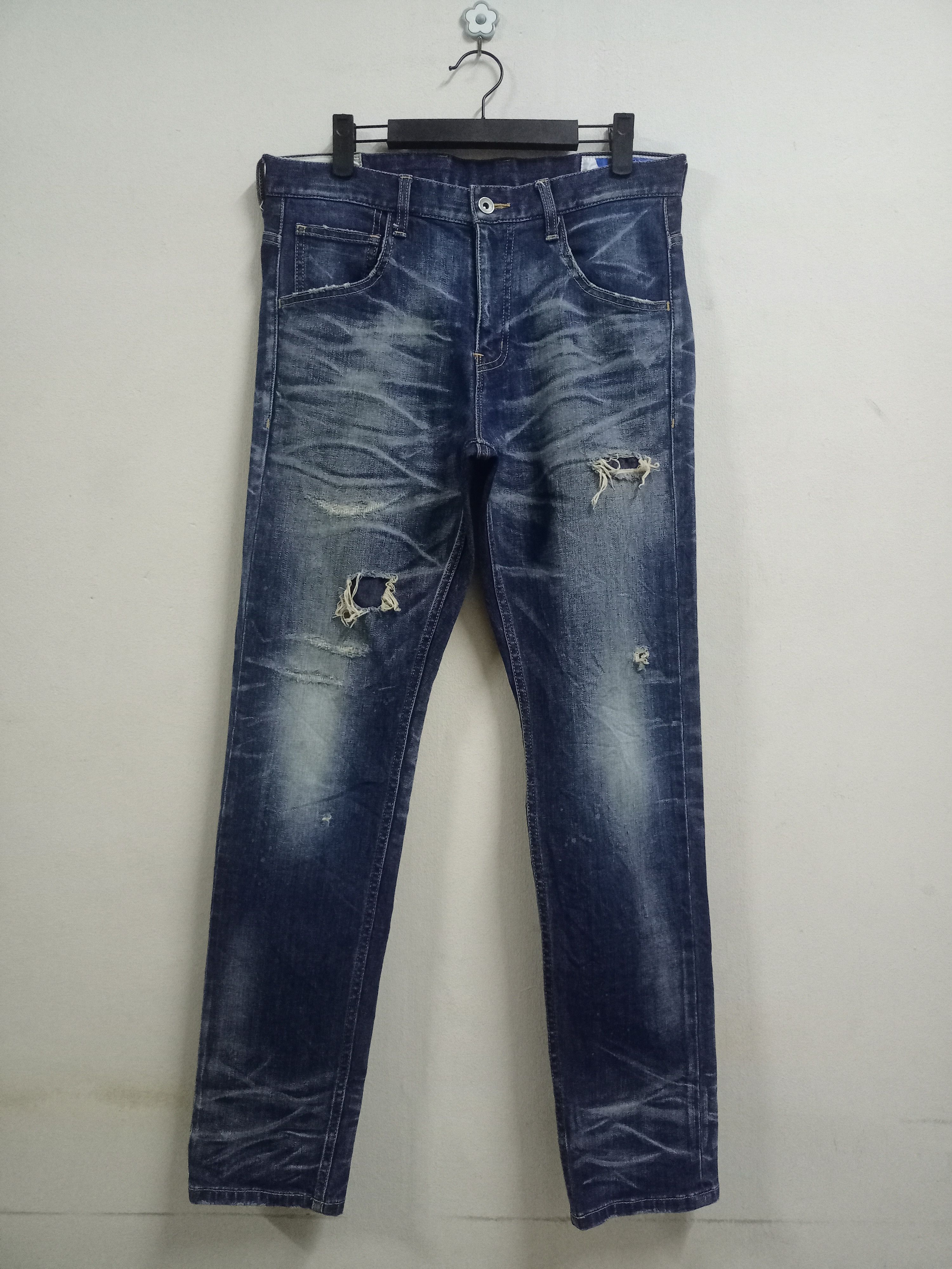 image of Distressed Denim Vintage Japanese Rattle Trap Bleached Distressed Jeans in Dark Blue Denim (Size 32