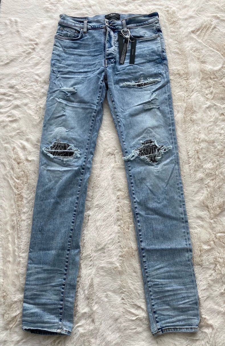 Amiri Washed blue leopard pattern patchwork MX1 jeans -DMC