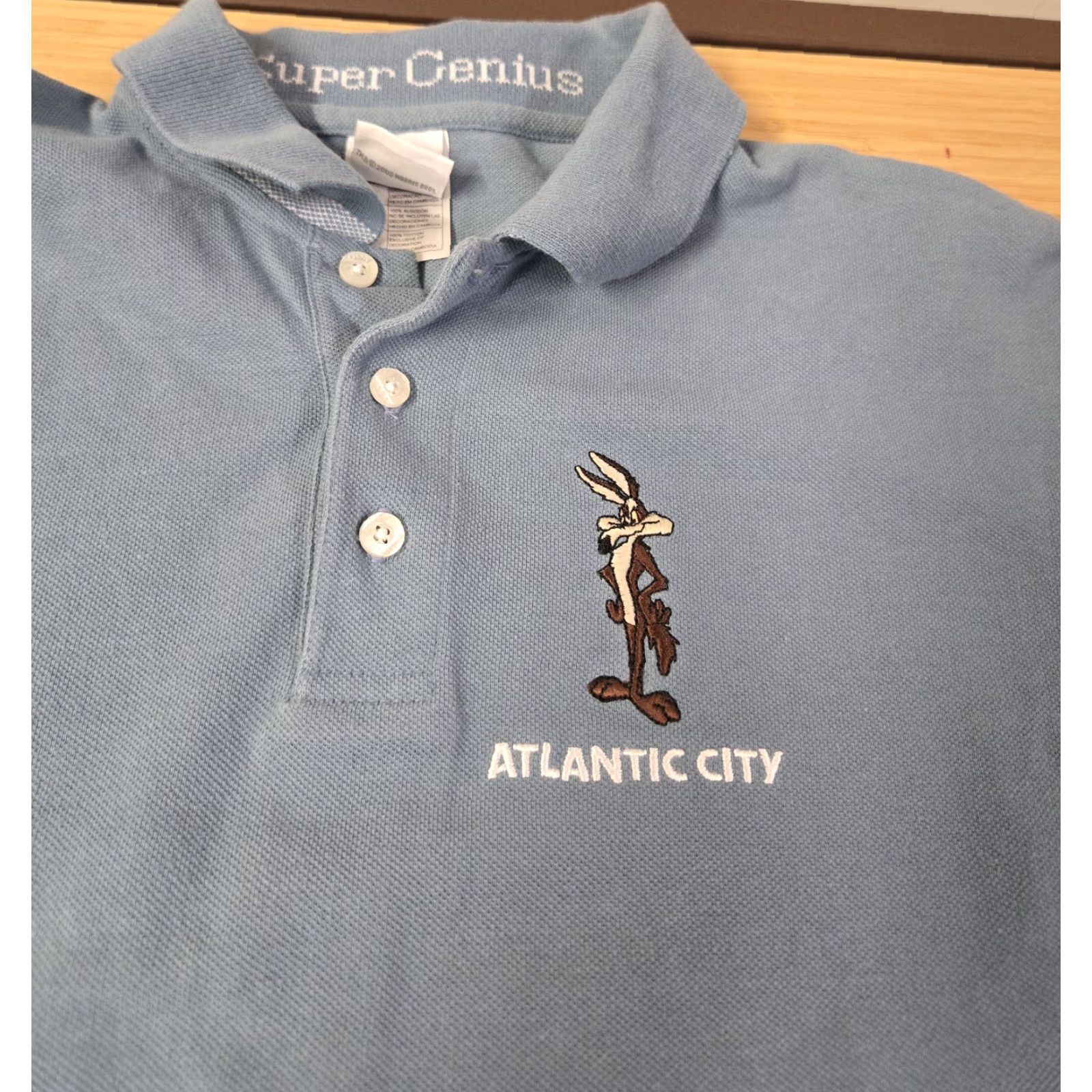 Vintage VINTAGE Warner Bros Wile E Coyote Polo Shirt Mens Small Blue Atlantic City Cartoon Super Genius Size US S / EU 44-46 / 1 - 4 Thumbnail