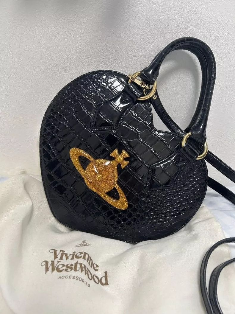 Vivienne Westwood size os Crocodile skin Saturn drop glue p