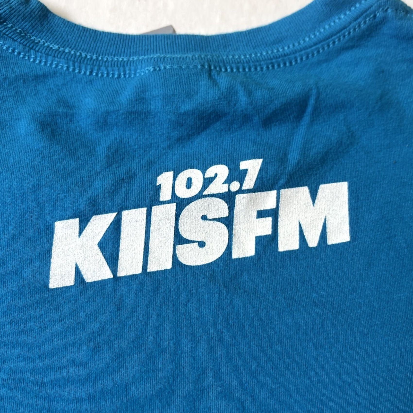 Next Level VINTAGE KIIS FM Radio 102.7 Rainbow Logo Shirt XL Blue Next Level Men Short Sleeve Crew Neck Graphic Print Concert/Never Worn Size US XL / EU 56 / 4 - 7 Thumbnail