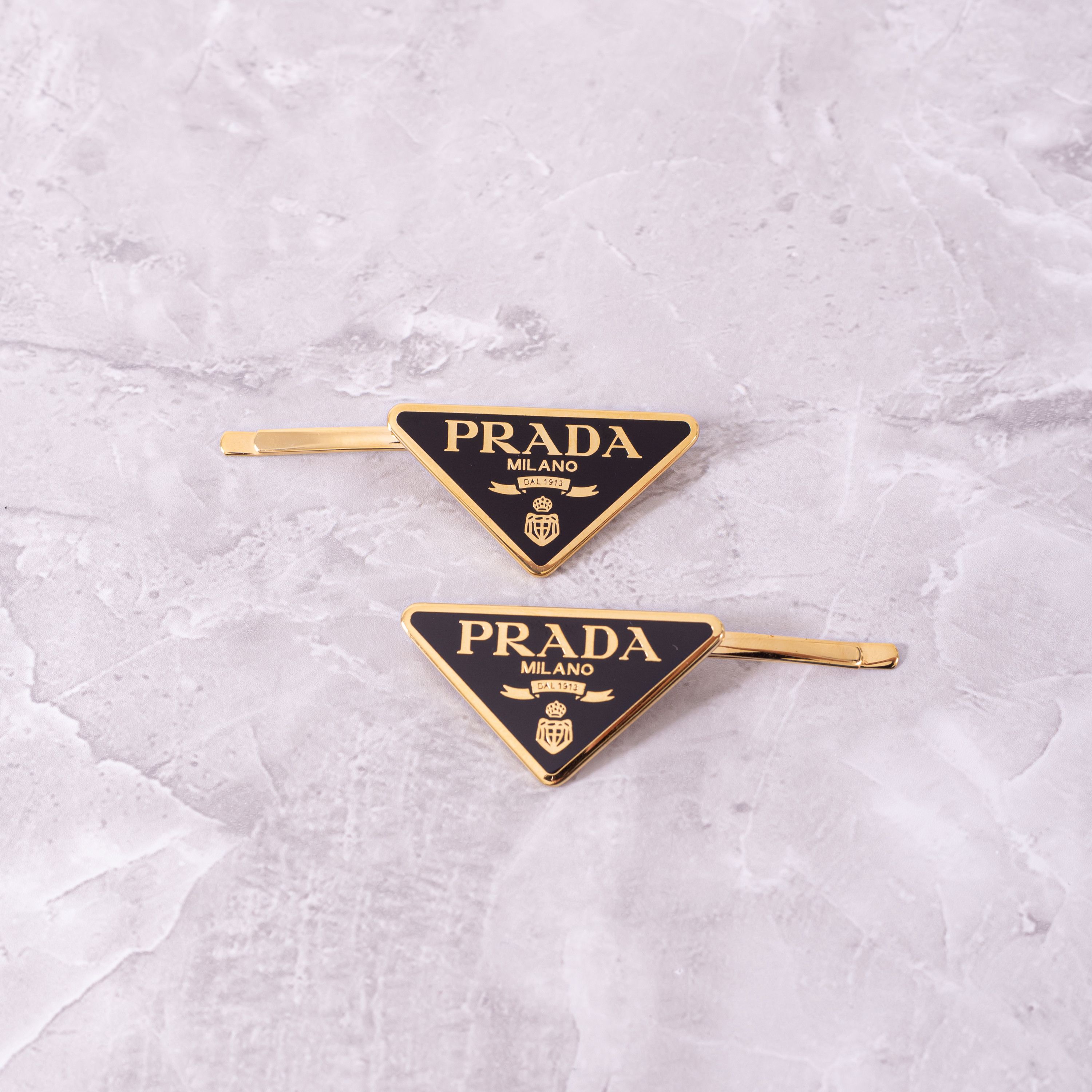 Prada PRADA Set Of 2 Logo Hair Clips BLACK/GOLD Size ONE SIZE - 1 Thumbnail