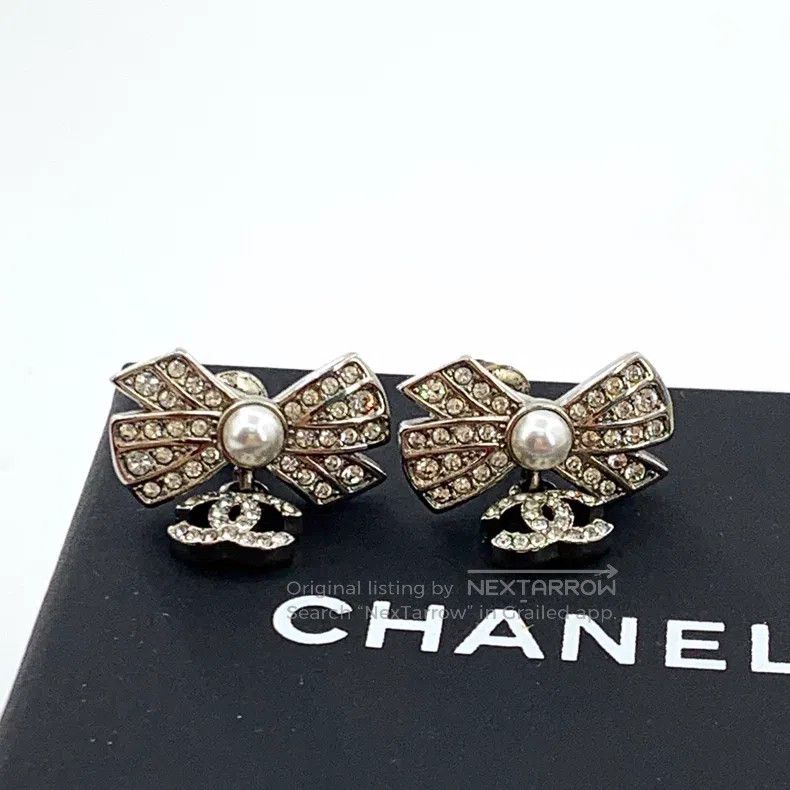 Chanel Chanel Silver bow double C diamond stud earrings Size ONE SIZE - 1 Thumbnail