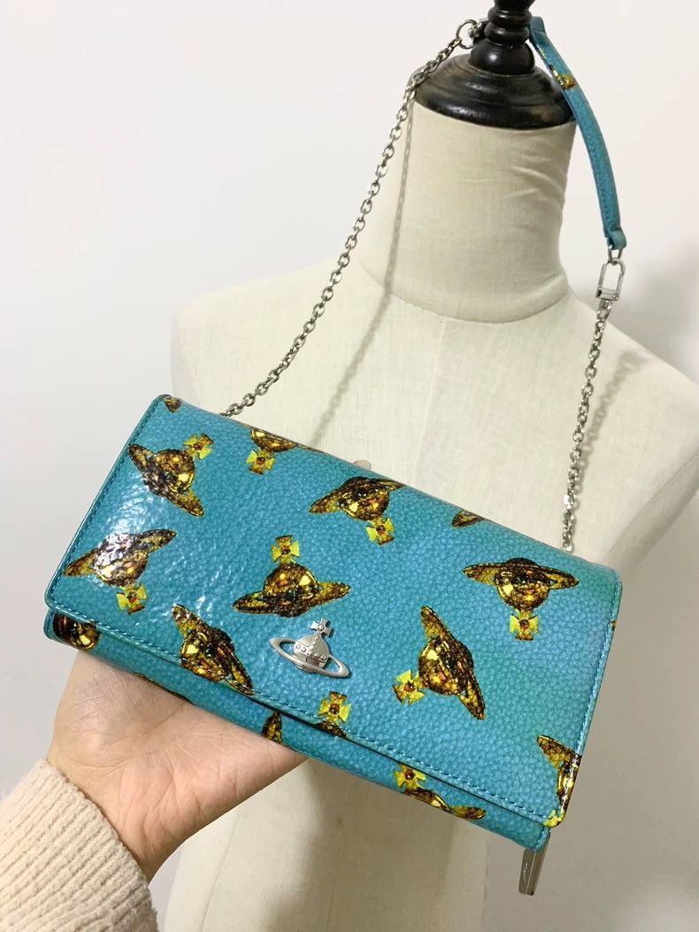 Vivienne Westwood Blue lacquered Saturn backpack wallet wi