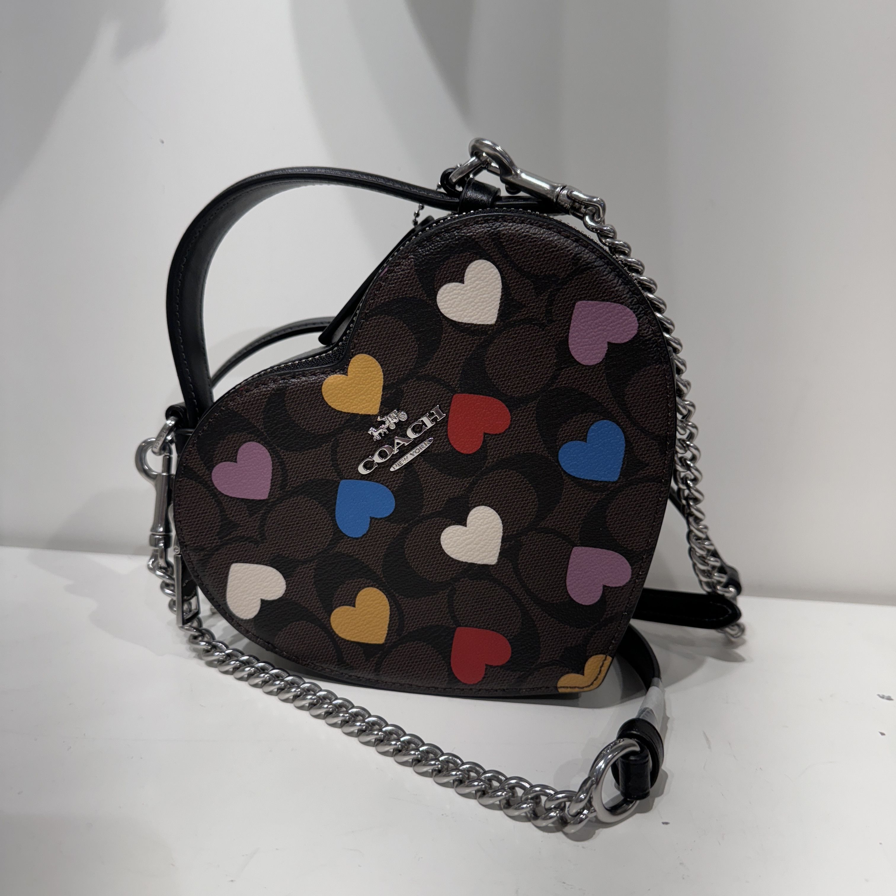 image of Coach Heart Crossbody In Signature Canvas With Heart Print in Brown, Women's