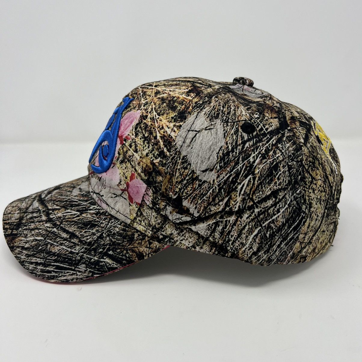 Sp5der Blue Logo Cap Real Tree Camo