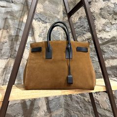 Saint Laurent Loden-coloured leather baby Sac De Jour bag