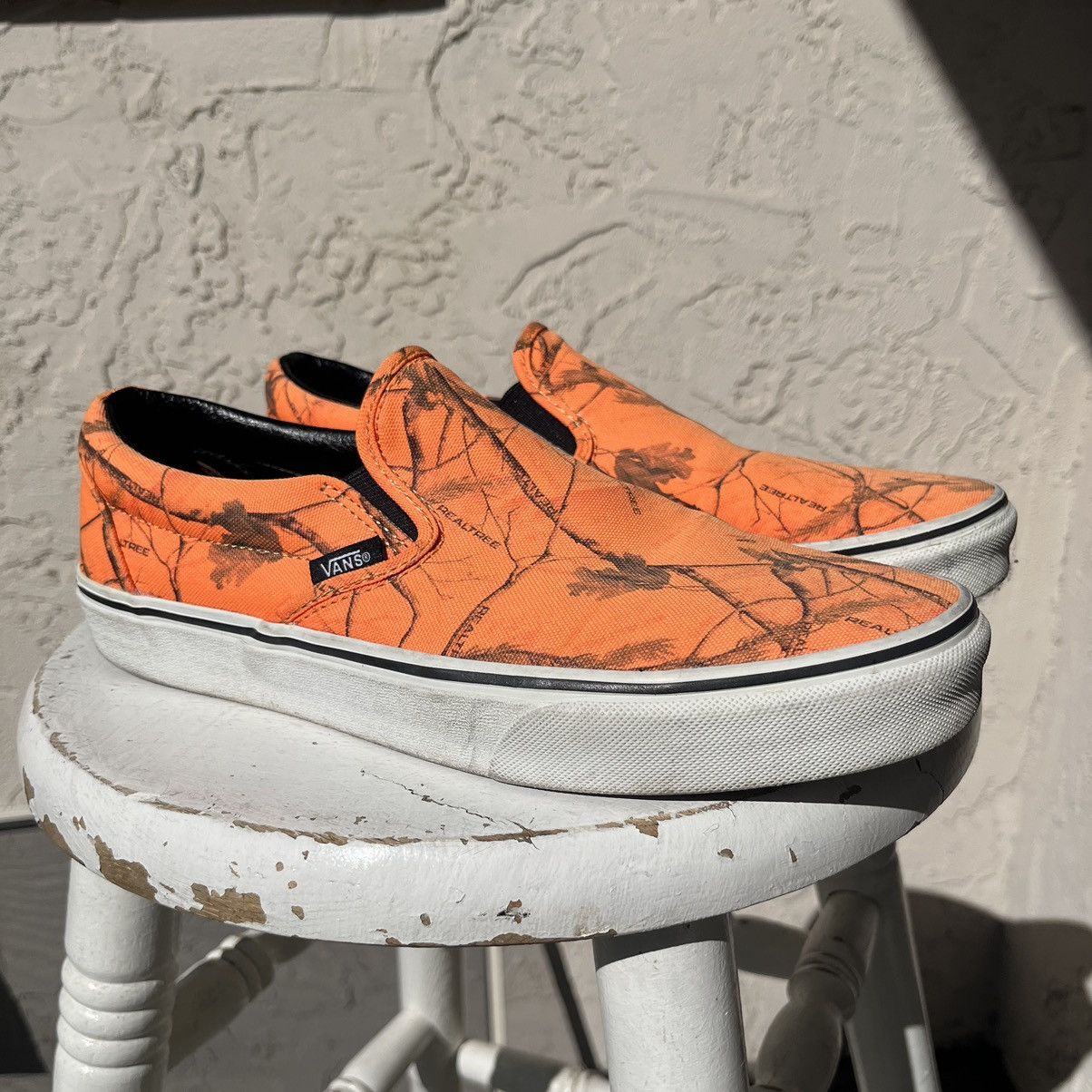 image of Vans Realtree Xtra Classic Slip-On Blaze Camo Shoes in Neon Orange, Men's (Size 10)