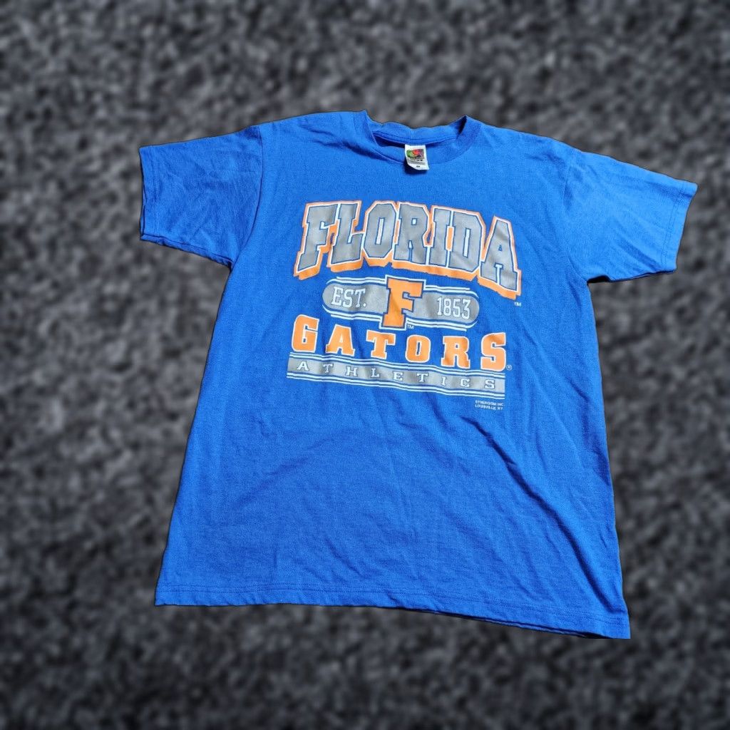 Fruit Of The Loom VINTAGE Fruit of the Loom T-Shirt Florida Gators 1990s Crew Neck Short Sleeve Blue L Mens 90s USA Football Theme, Cotton Blend, Graphic Print Size US L / EU 52-54 / 3 - 1 Thumbnail