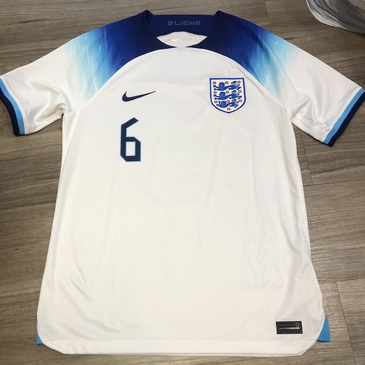image of Nike x Soccer Jersey England 22/23 Home Shirt 6 Maguire in White, Men's (Size Medium)