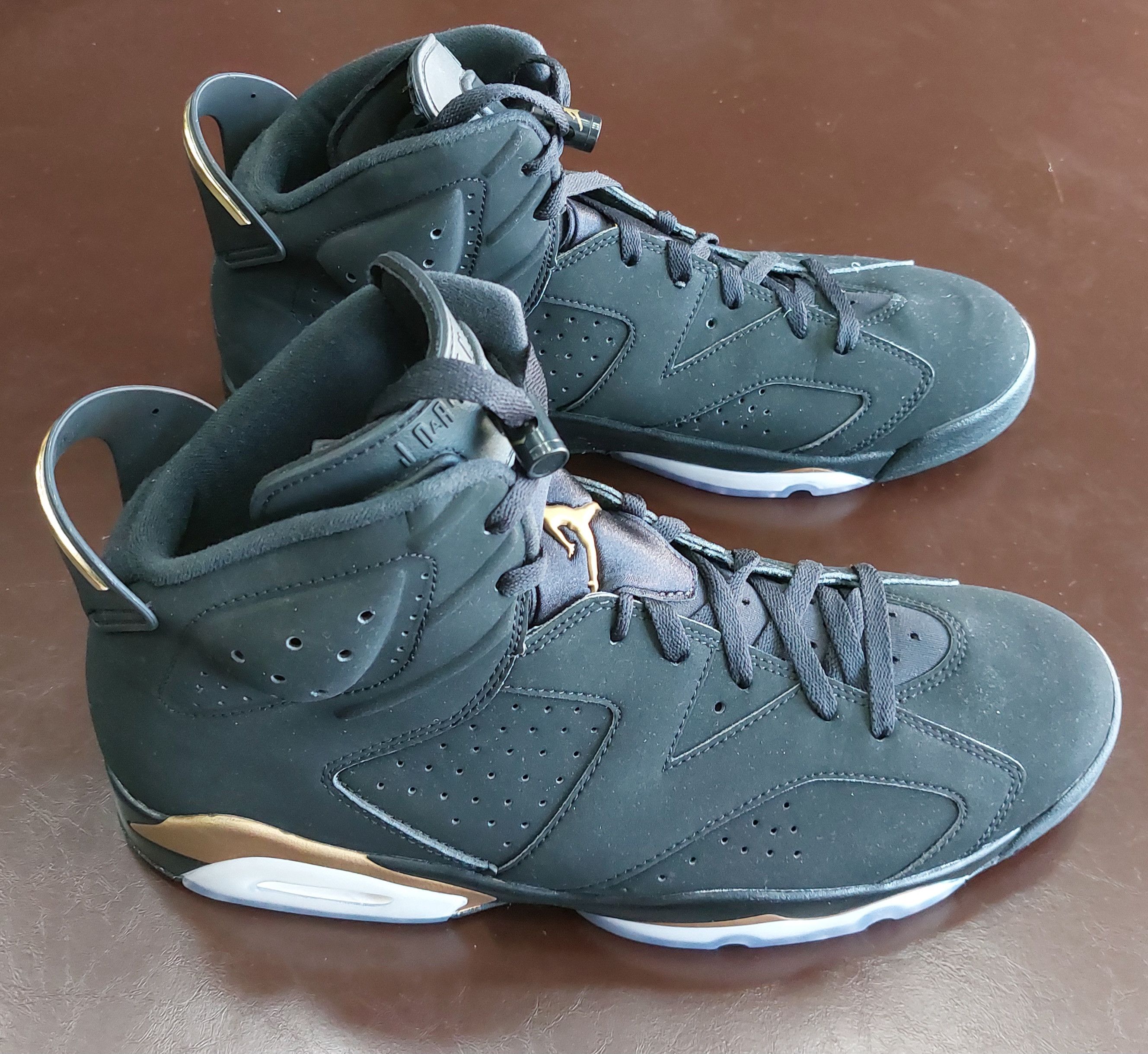 image of Jordan Brand 6 Retro Defining Moments 2020 Shoes in Black, Men's (Size 13)