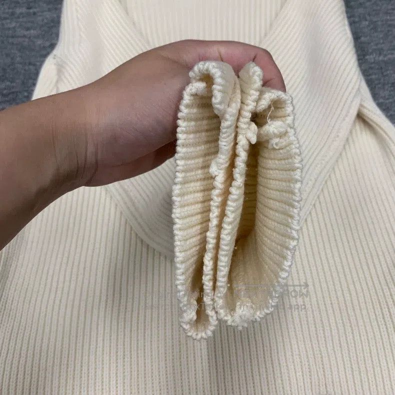 The Row White wool knit sweater