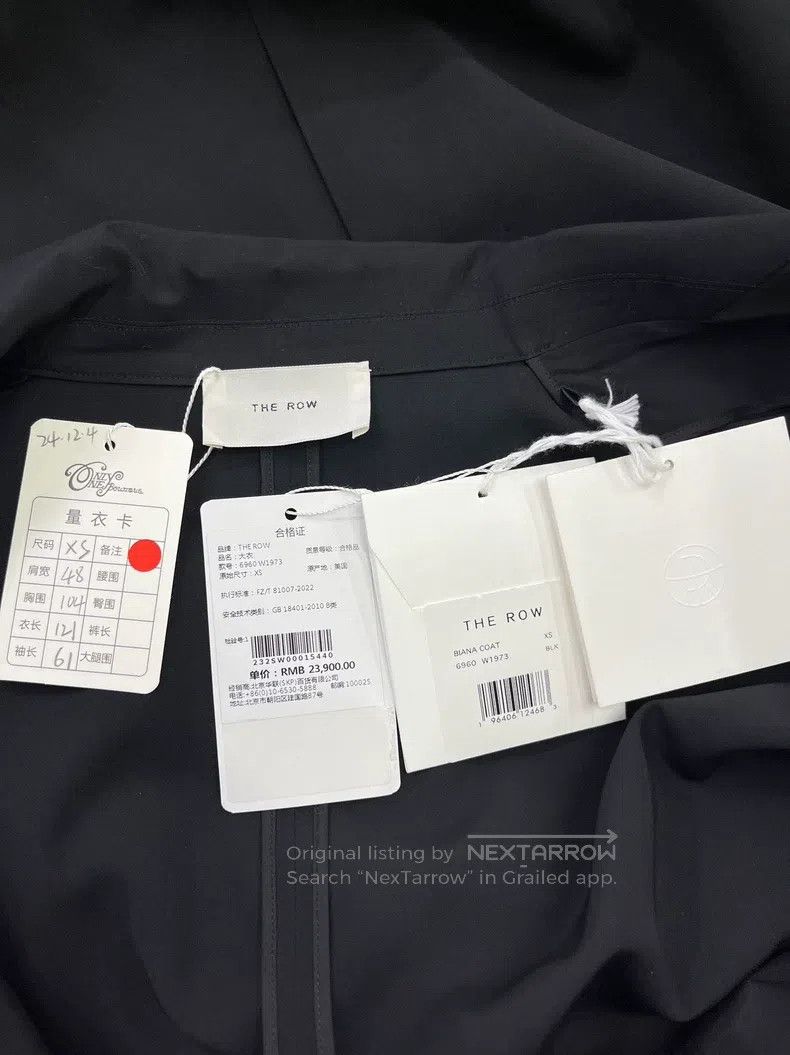The row Black windbreaker coat