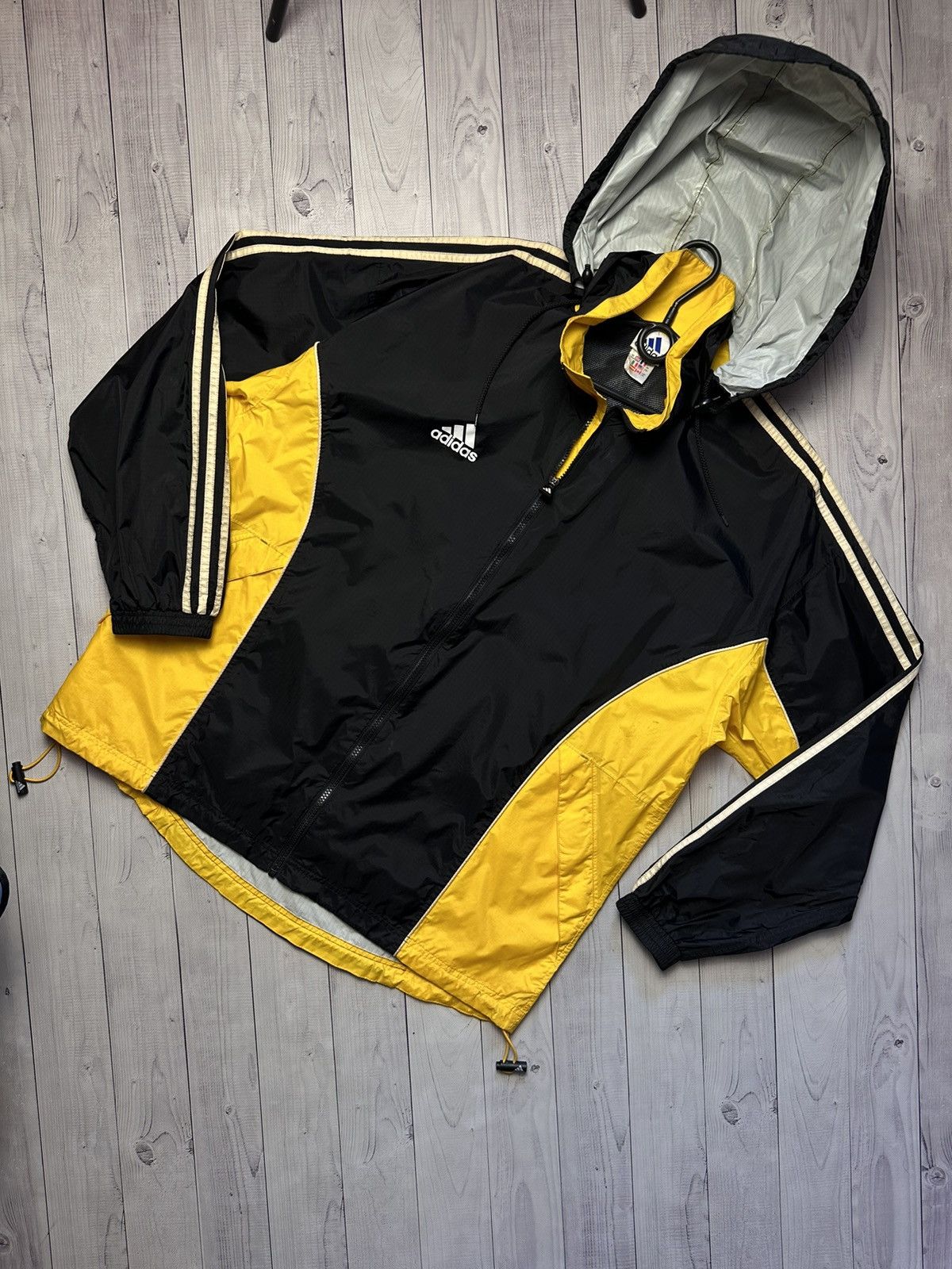 Vintage adidas light jacket size L striped yellow logo