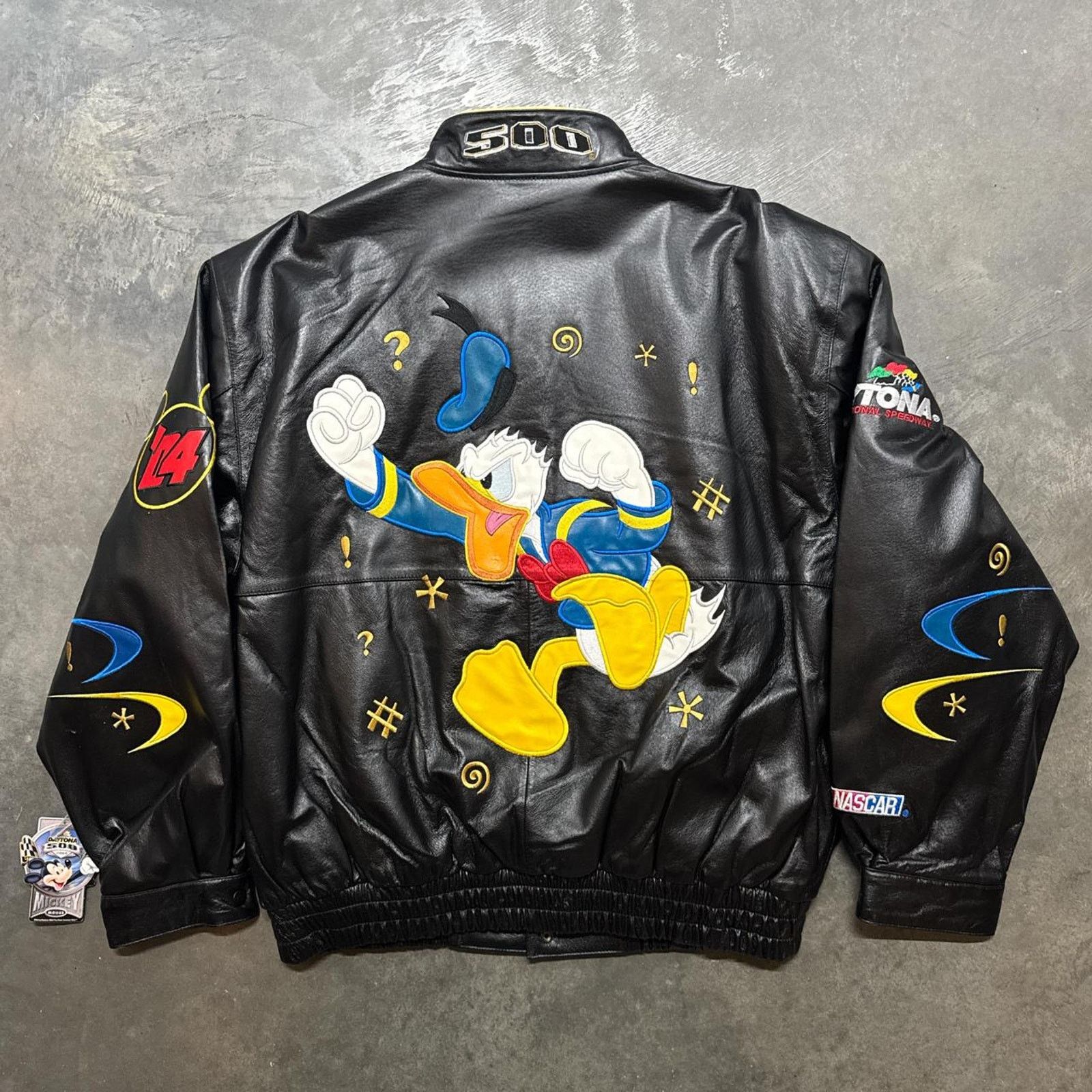 Disney × Vintage Vintage JH Design Donald Duck NASCAR Disney Leather Jacket Size US XL / EU 56 / 4 - 1 Thumbnail