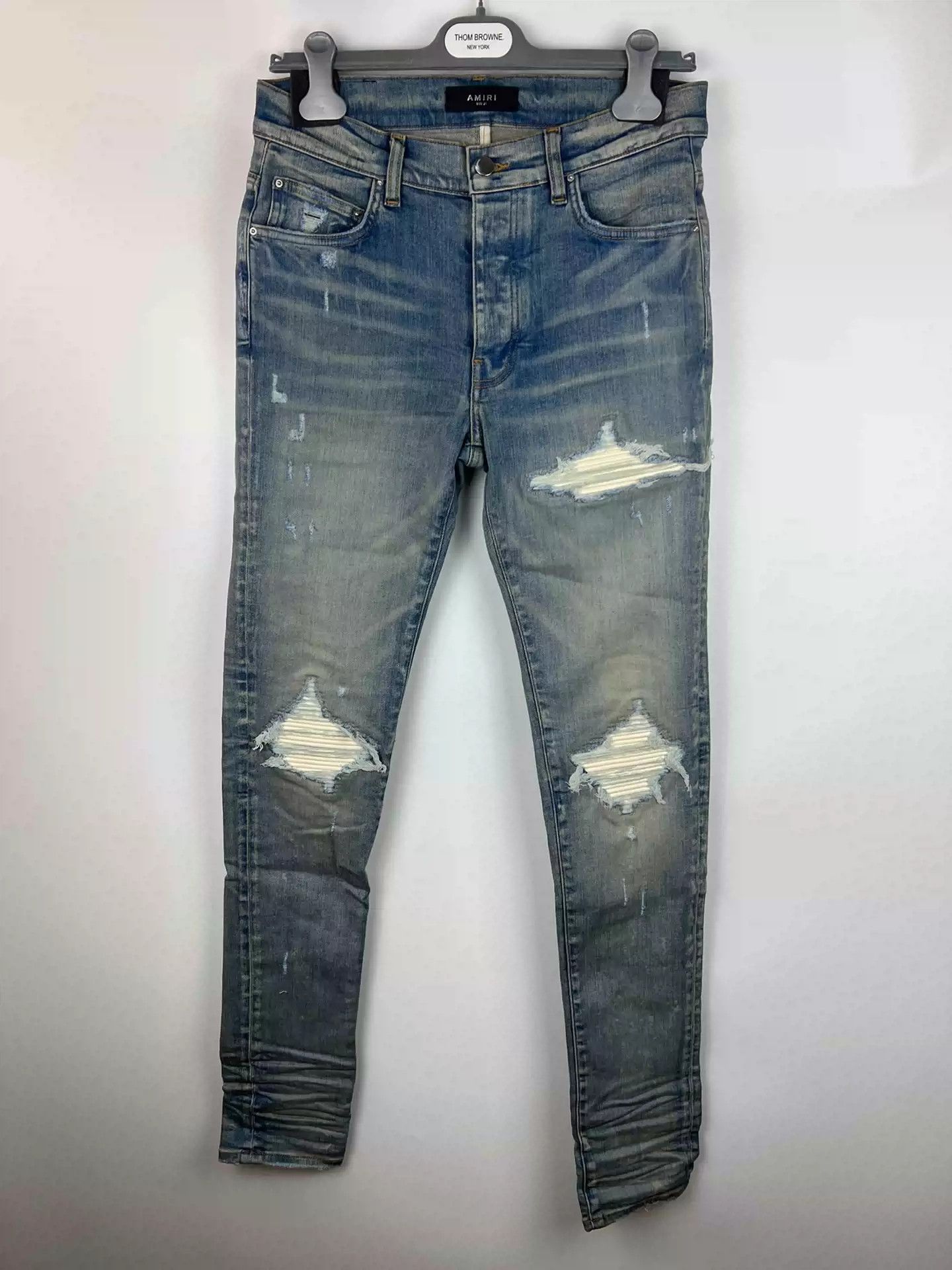 Amiri Amiri classic washed blue and white patchwork mx1 jeans Size US 31 - 1 Thumbnail