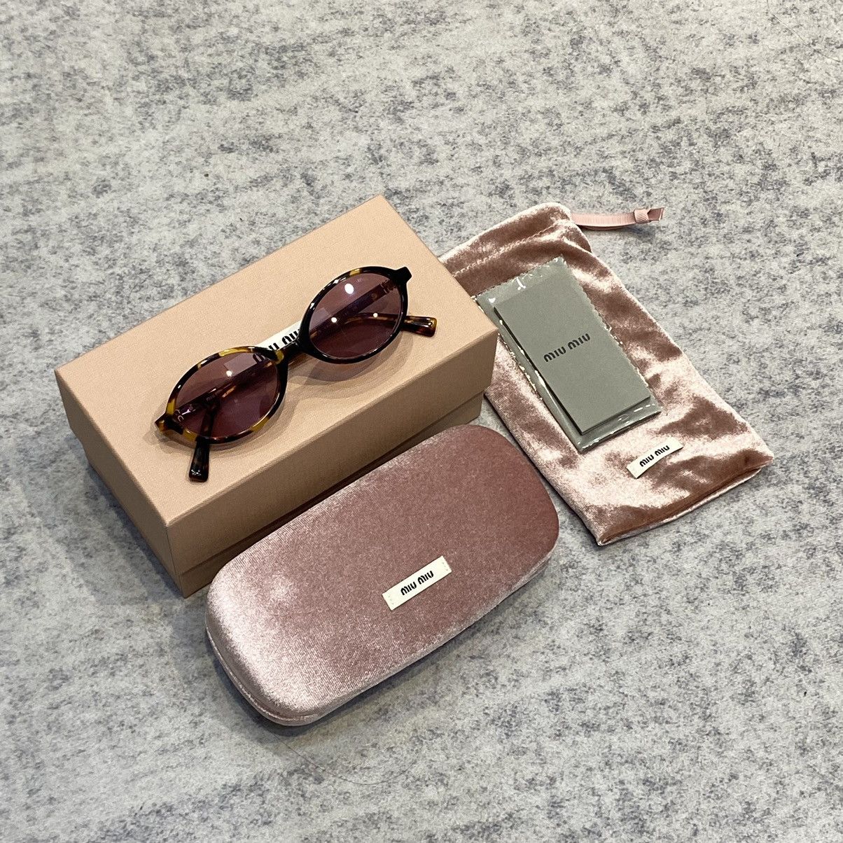 Miu Miu MIU MIU MU 04ZS VAU50D Eyewear HONEY Size ONE SIZE - 4 Thumbnail