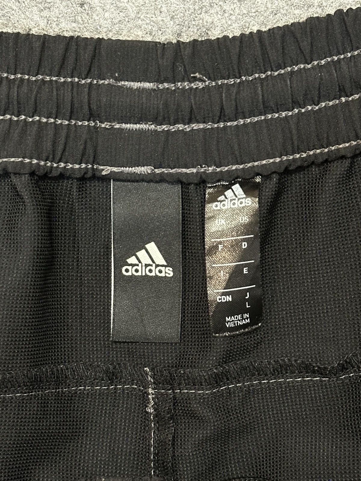 Adidas Adidas black three-quarter length training pants. Size US 31 - 11 Thumbnail