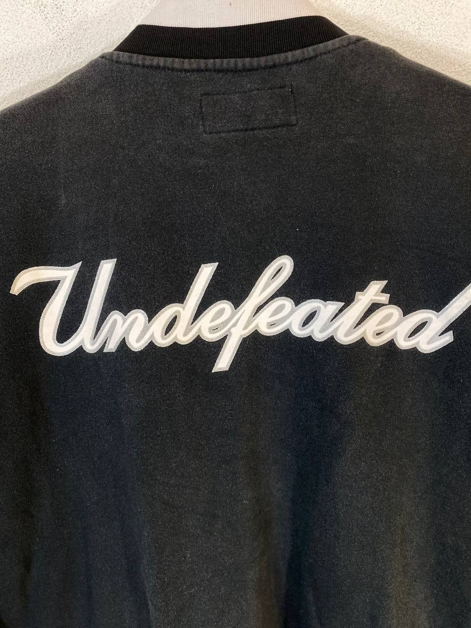 Undefeated undefeated black jacket spell out backhit nice design Size US M / EU 48-50 / 2 - 9 Thumbnail