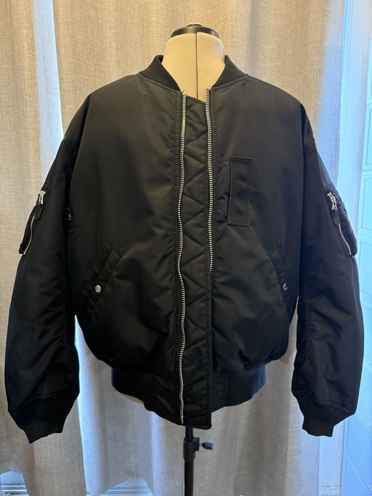 Takahiro miyashita x phenix bomber down jacket