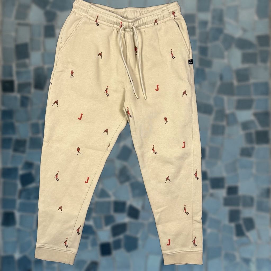 Jordan Brand Air Jordan Sweatpants Men's L Fleece Pants All Over Print Jumpman AOP DV9390 Size US 33 - 1 Thumbnail