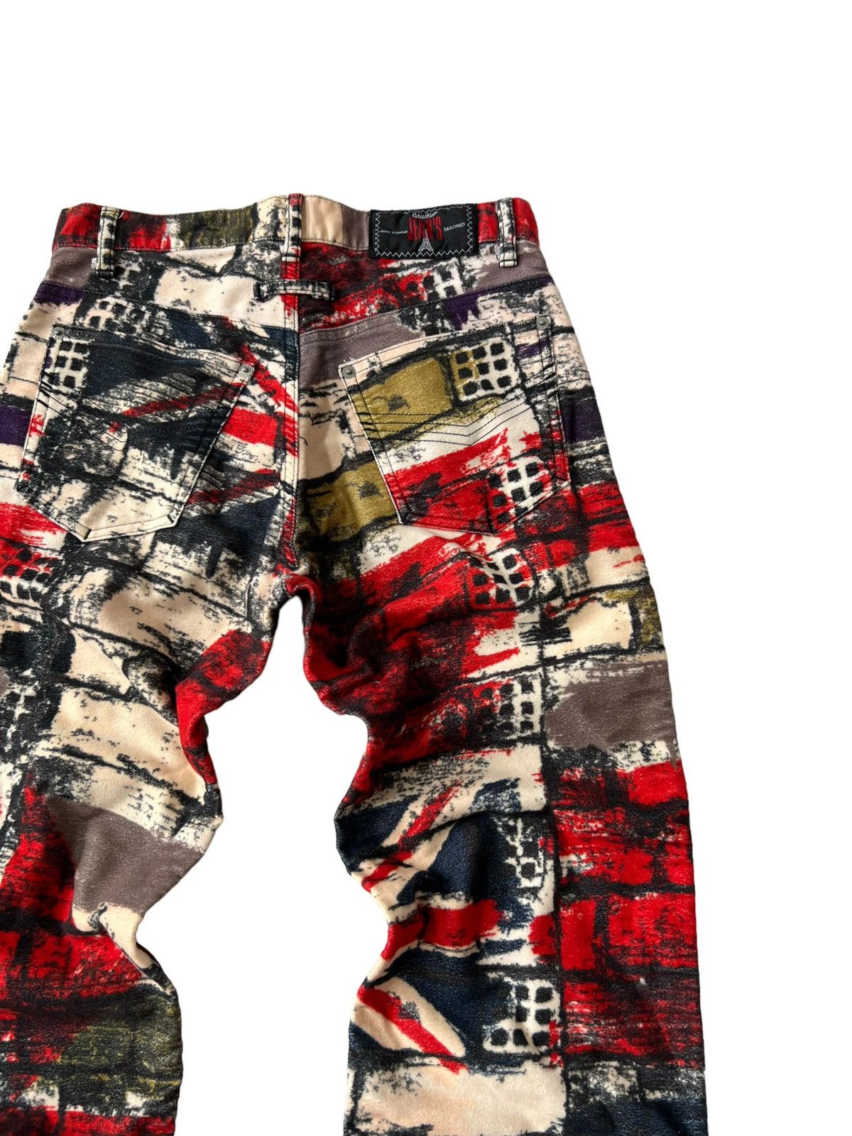 Jean Vintage Jean Paul Gaultier AW97 « Fight Racism » - Taille S (34") - Coupe Droite - Rouge Brique