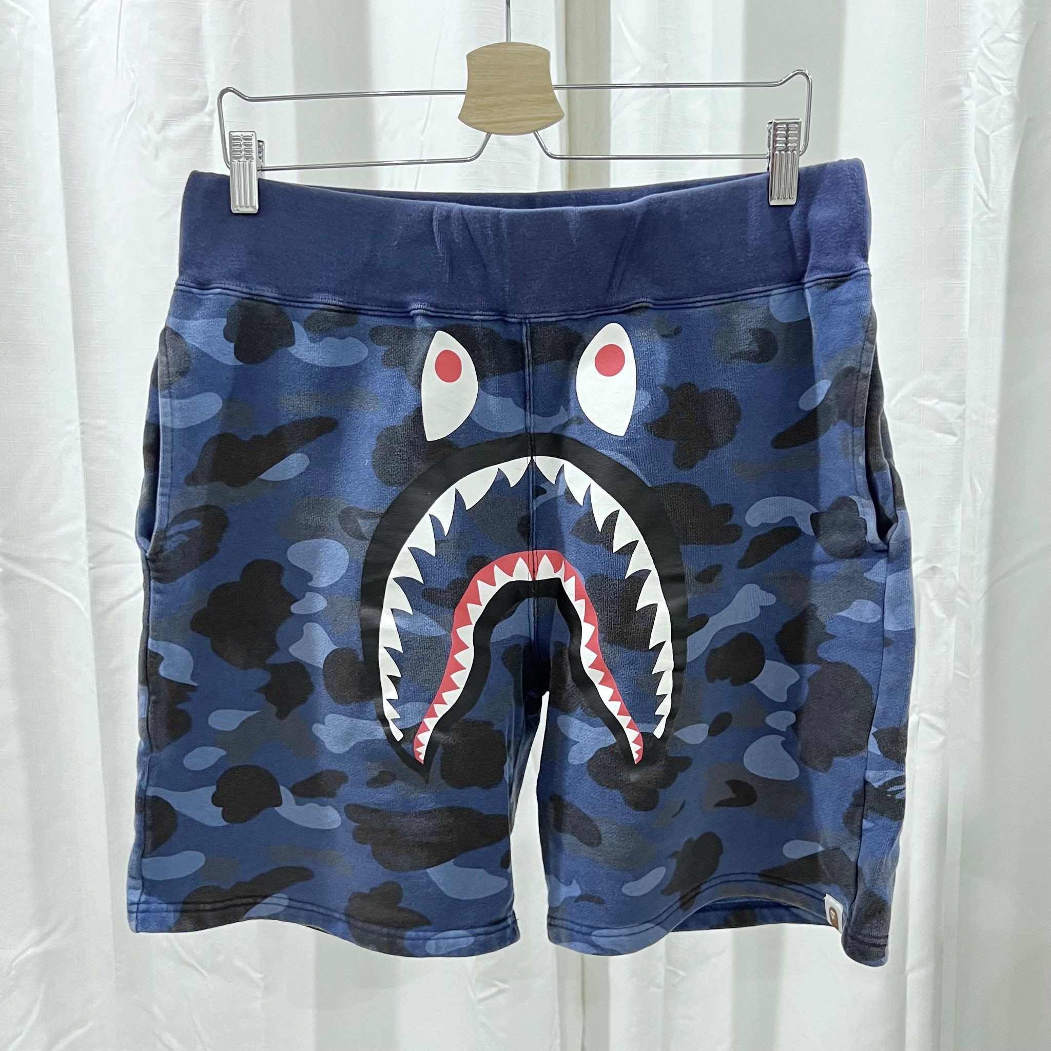 image of Bape Blue Camo Shark Made In Japan Cotton Shorts in Blue Black, Men's (Size 31)