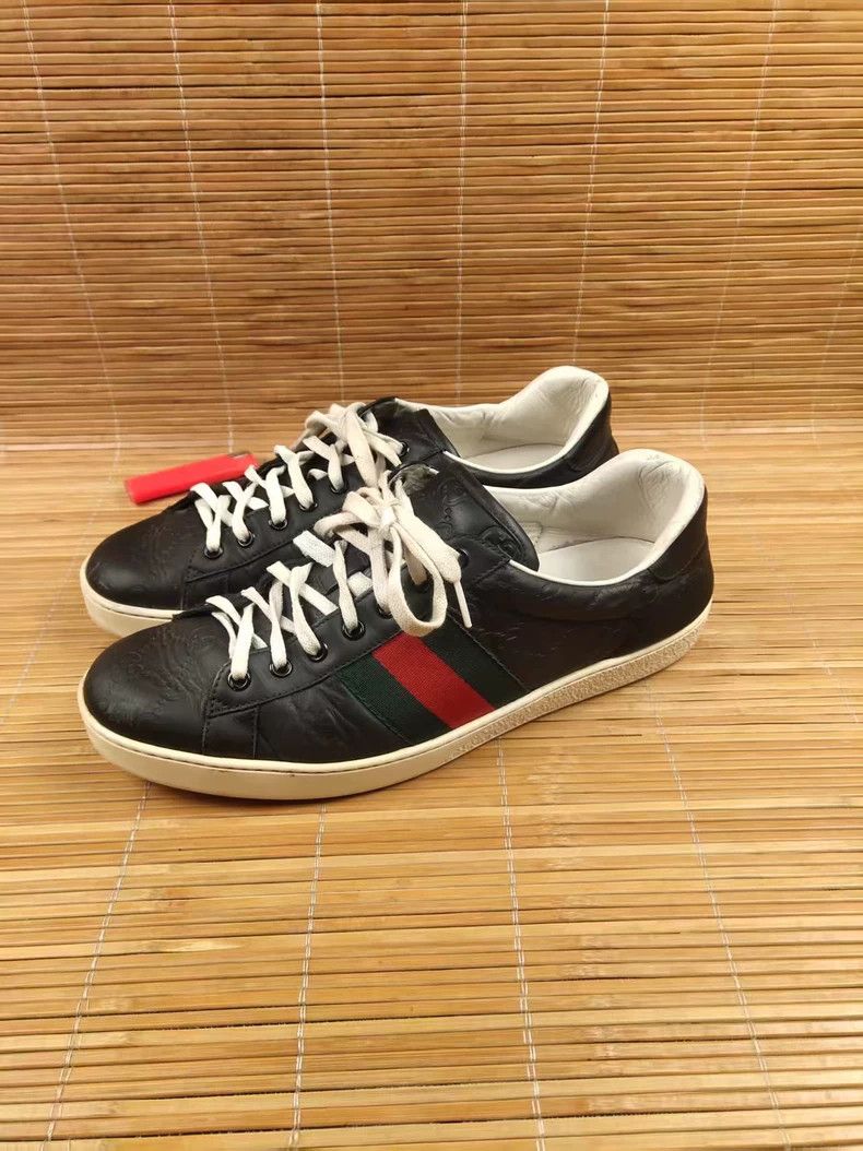 Gucci Embossed Leather Low-Top Sneakers - dmc