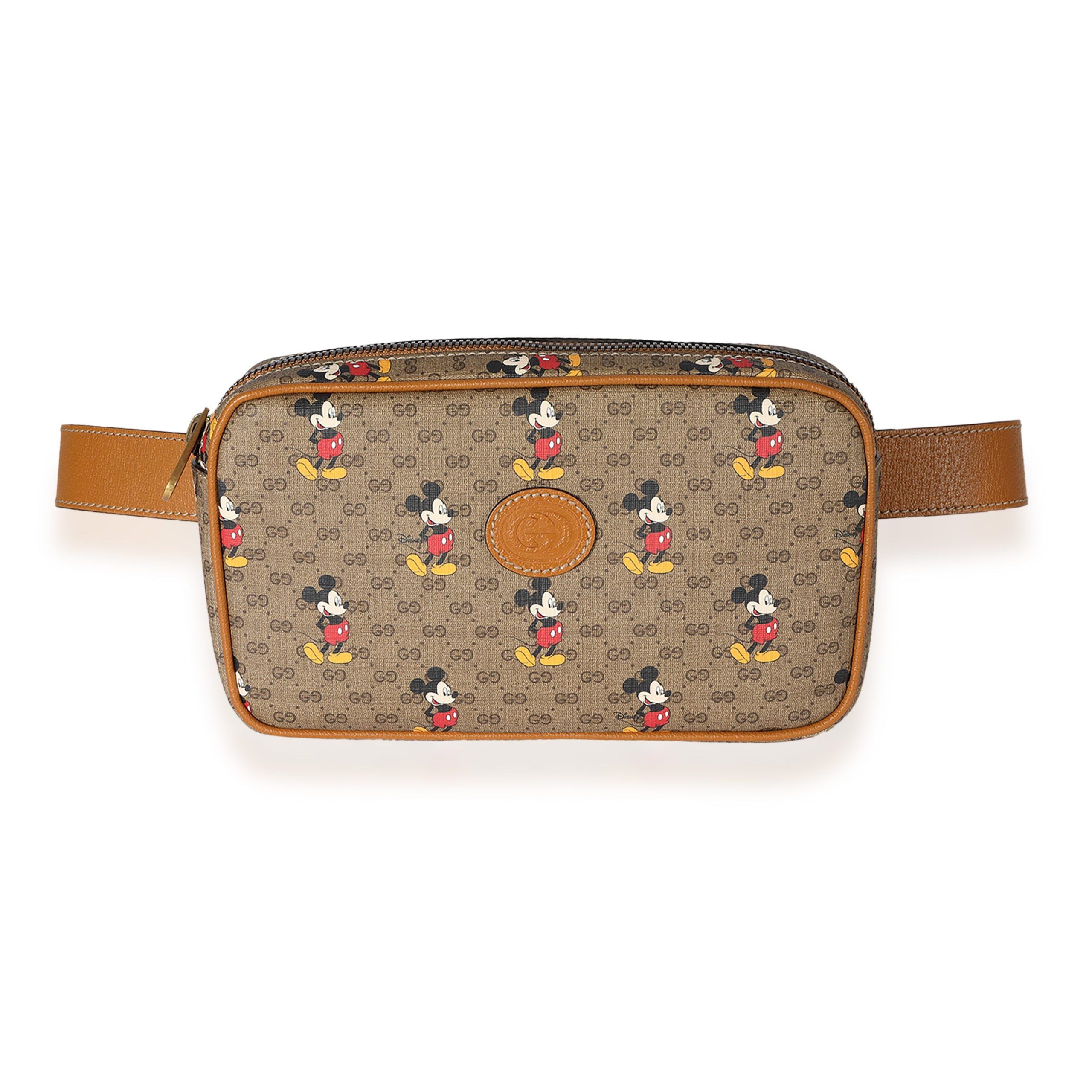 image of Gucci X Disney Vintage GG Supreme Mickey Mouse Belt Bag 95 in Brown, Women's