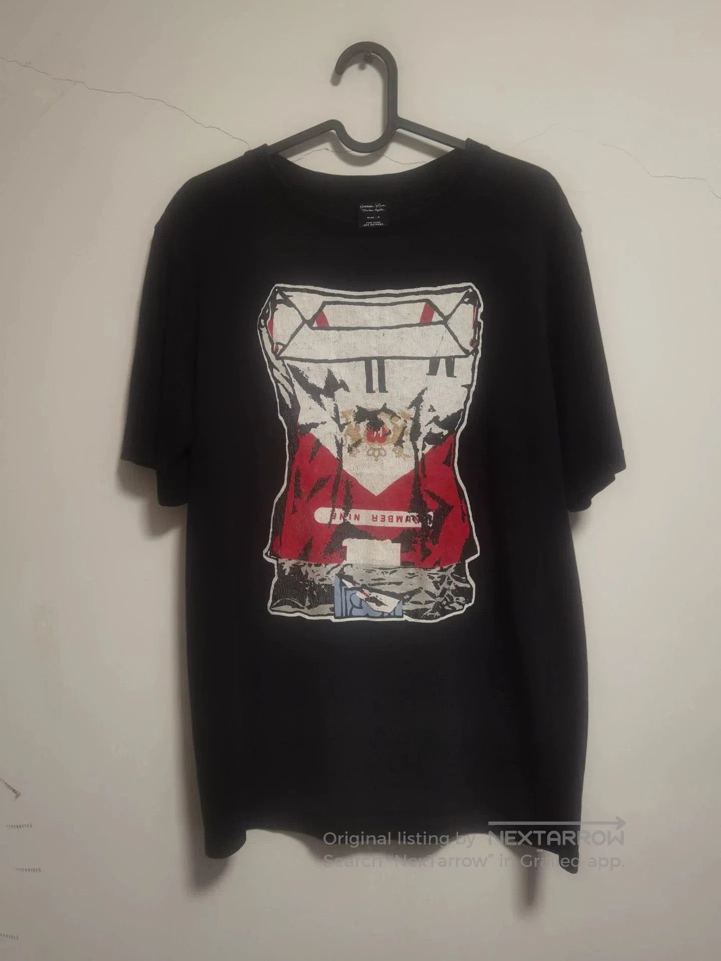 number (n) ine graphic short sleeve tee.