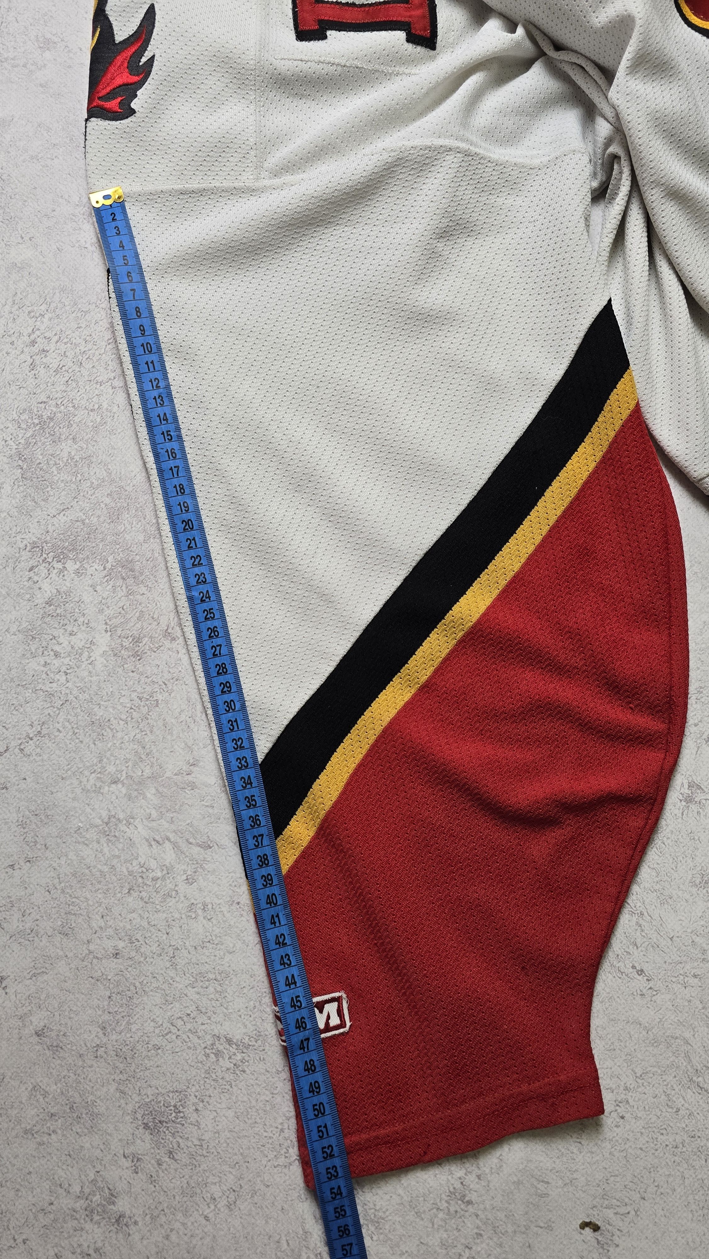 Ccm VTG CCM Air-Knit Calgary Flames Dolan #1 NHL Hockey Jersey Size US M / EU 48-50 / 2 - 5 Thumbnail