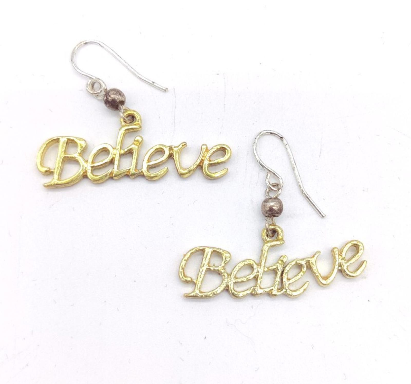 The Unbranded Brand BELIEVE Charm Earrings Gold Tone Pierced Hook Great For Chri Size ONE SIZE - 1 Thumbnail