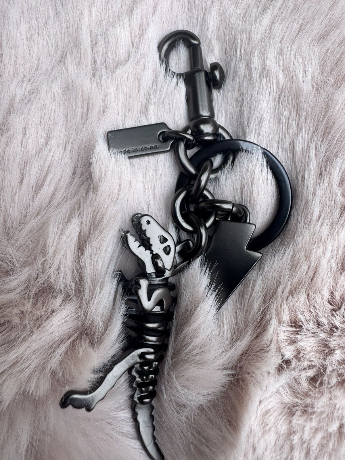 Coach Coach Metal Small Rexy T-Rex Skeleton Puzzle Charm Keychain Size ONE SIZE - 2 Thumbnail
