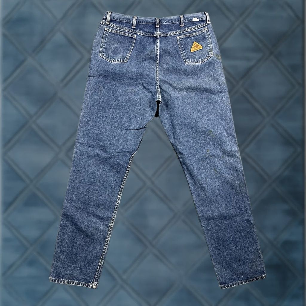 Vintage Bulwark Jeans Mens Pant Blue 42x38 ARC Rating 20.7 ATPV Protective Apparel Med Wash Bulwark Men Jeans Pants Blue 42x38 FR Safety Workwear Size US 42 / EU 58 - 1 Thumbnail