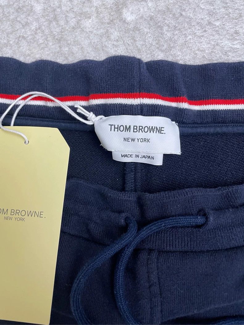 Thom Browne Thom browne Dark blue classic four-striped sports shorts 25 Size US 30 / EU 46 - 5 Thumbnail